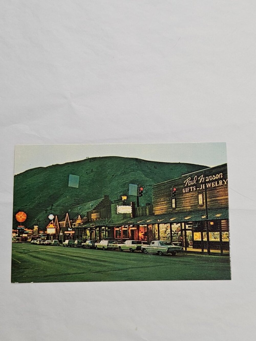 Jackson at Night Business Section in Jackson Wyoming Postcard